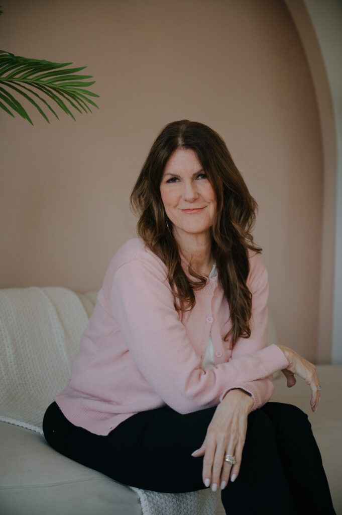 Erin Kennedy executive career coach seated portrait