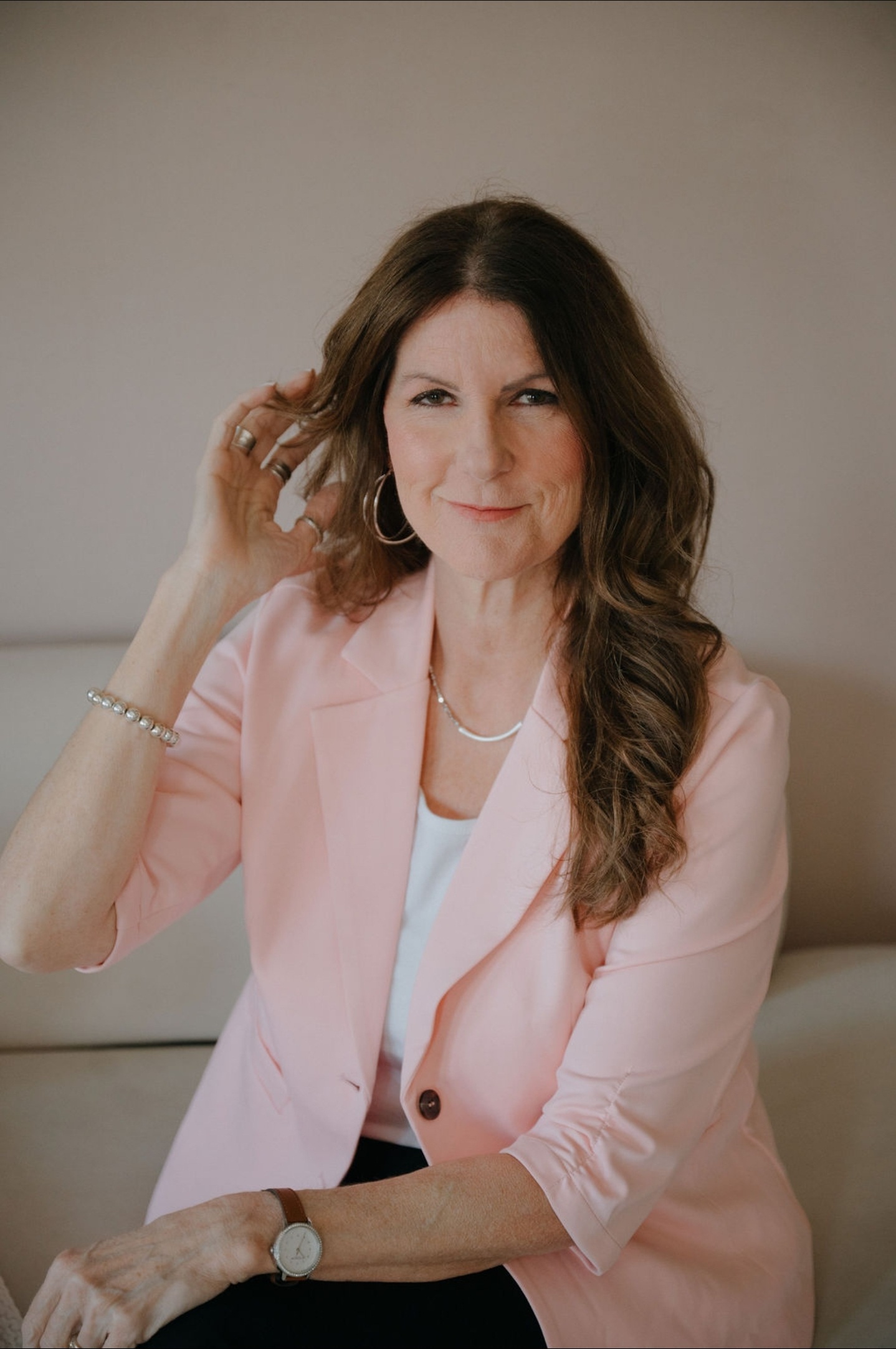 Erin Kennedy executive career coach pink blazer portrait