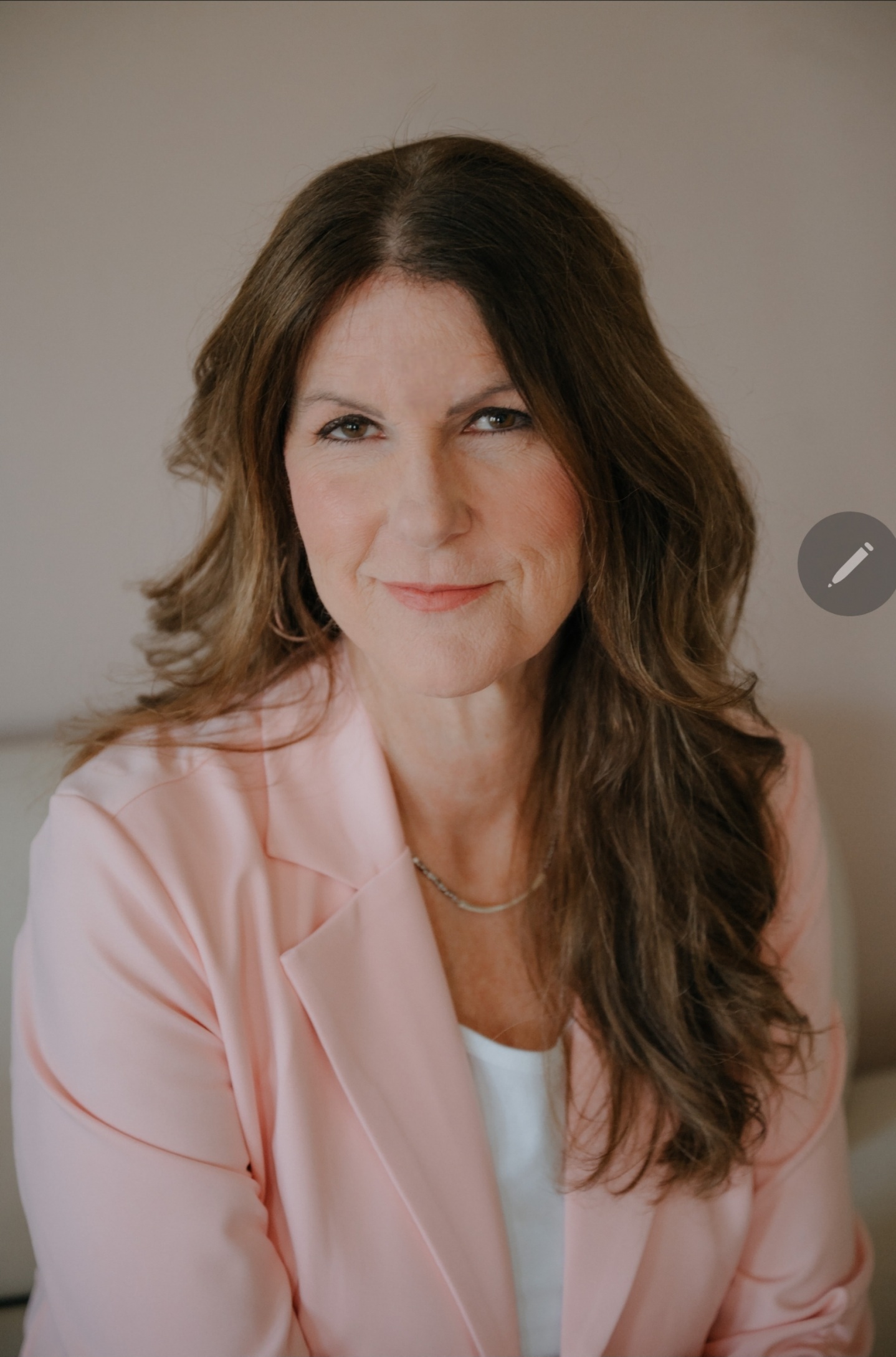 Erin Kennedy executive career coach pink blazer portrait