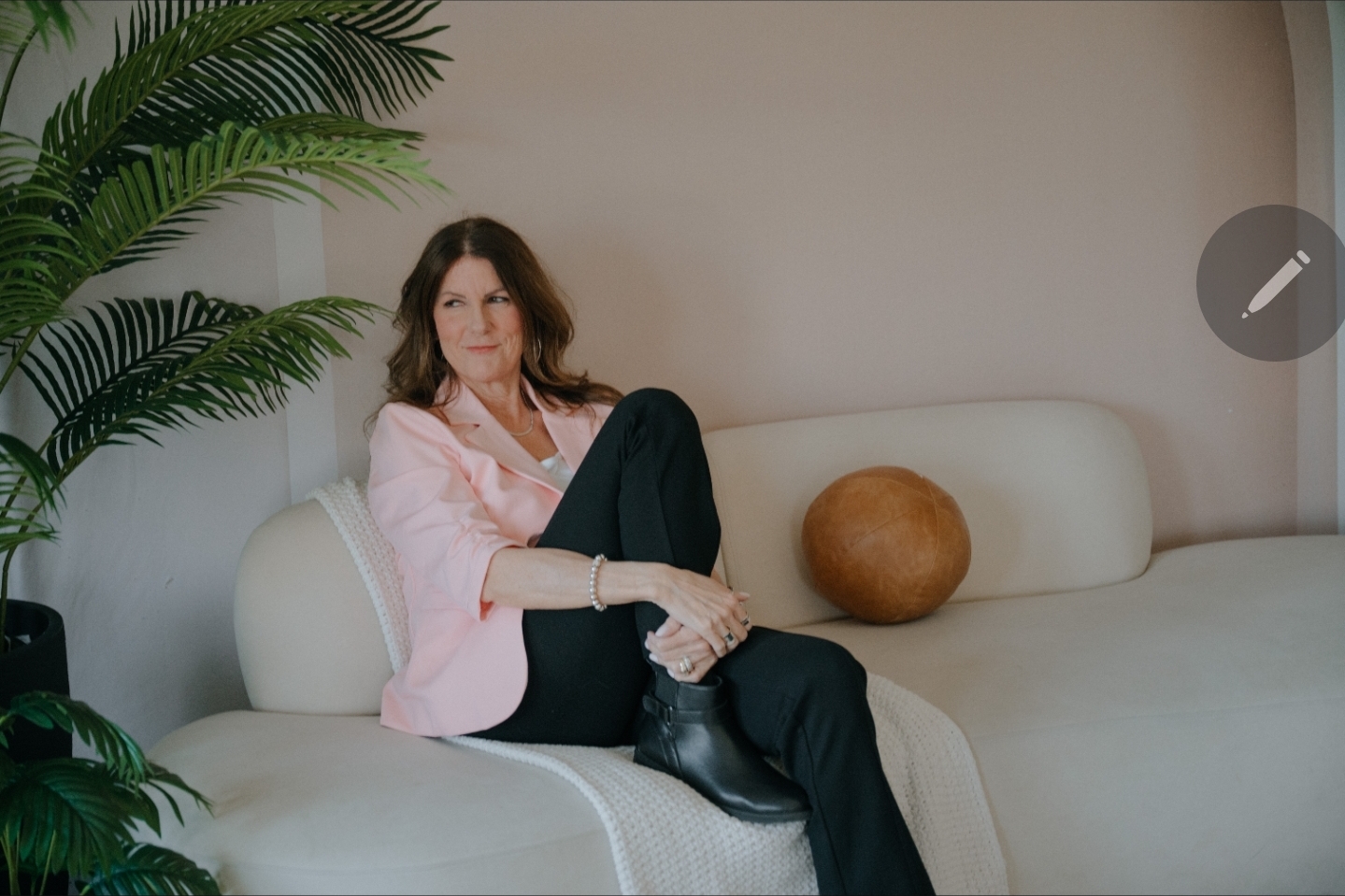 Erin Kennedy executive career coach seated in studio