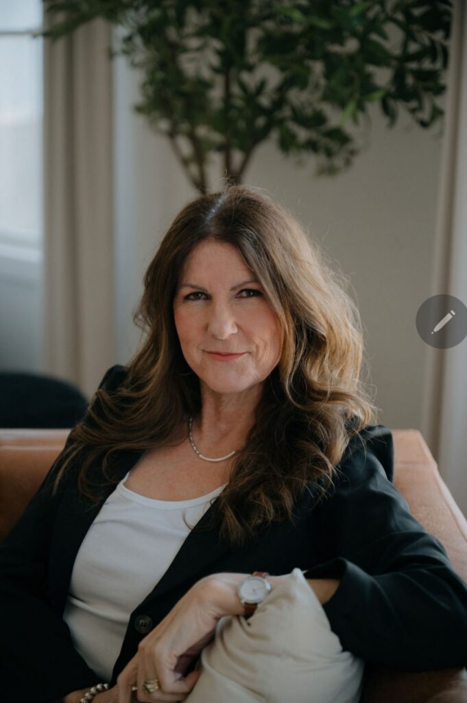 Erin Kennedy executive career coach black blazer portrait