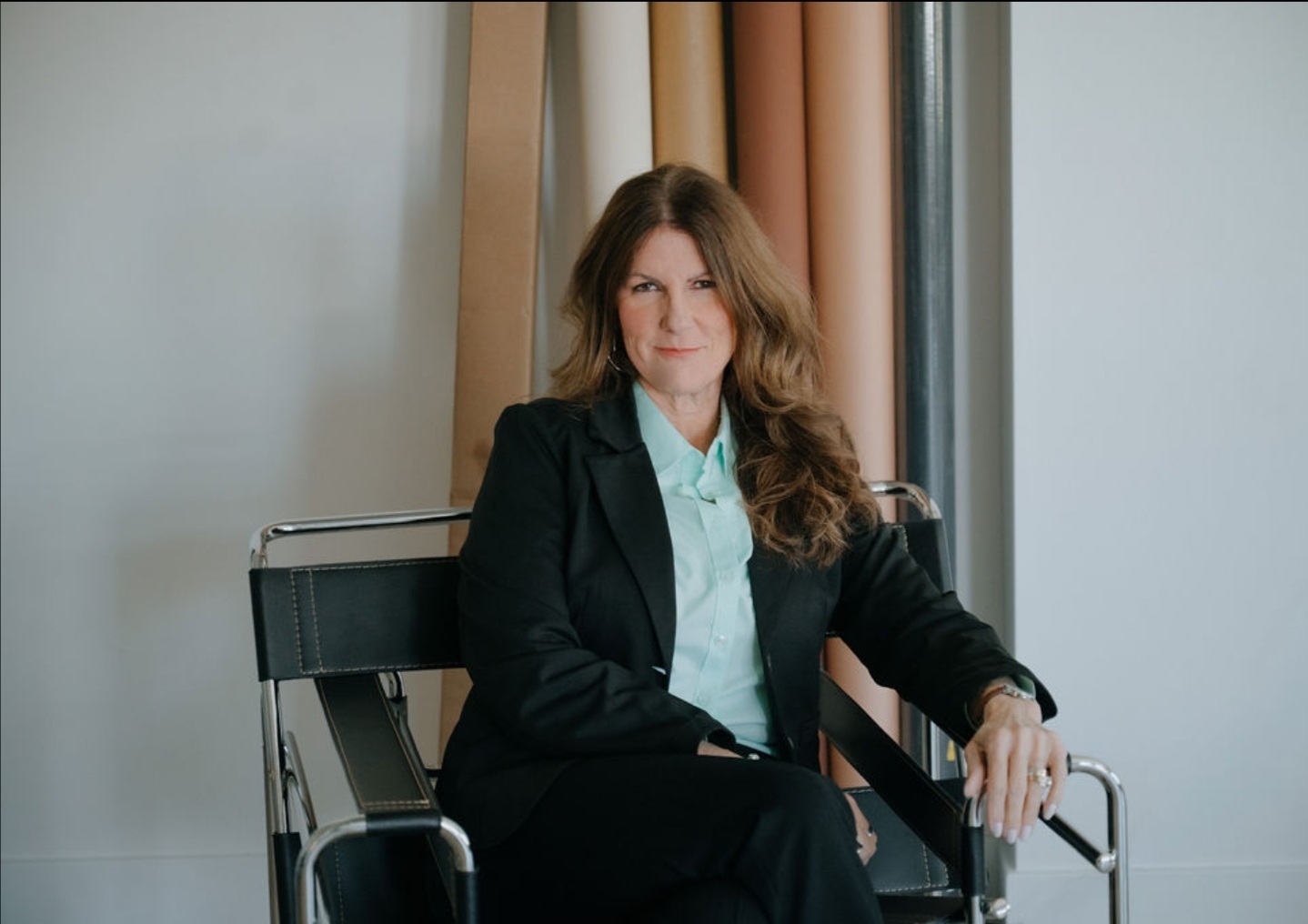 Erin Kennedy executive career coach in professional black suit