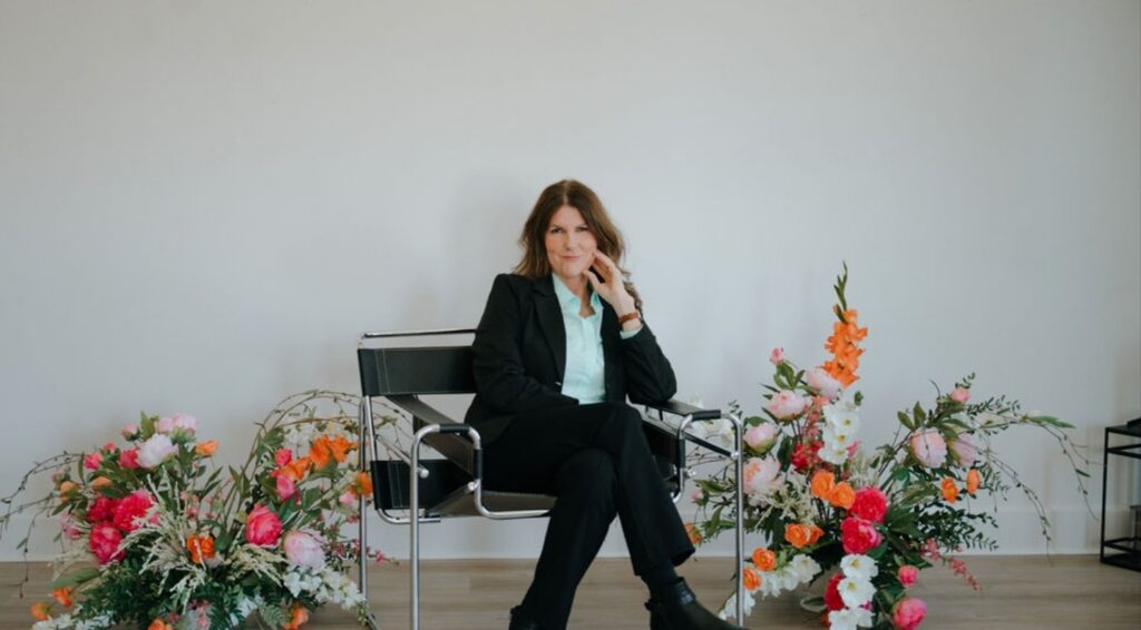 Erin Kennedy executive career coach black suit portrait