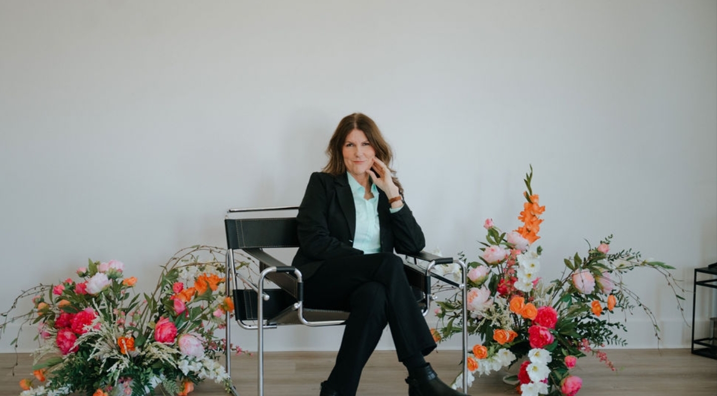 Erin Kennedy executive career coach black suit portrait